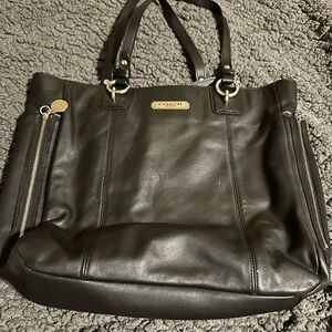 Vintage black leather coach, tote bag, side, zipper pockets, pockets inside